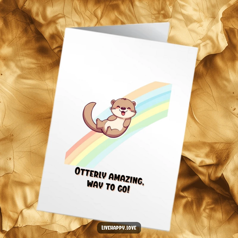 Funny Free Printable Congratulations Card: Energetic otter joyfully sliding down a vibrant rainbow, leaving a trail of colorful joy.